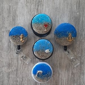 Beach themed phone grip or badge reel